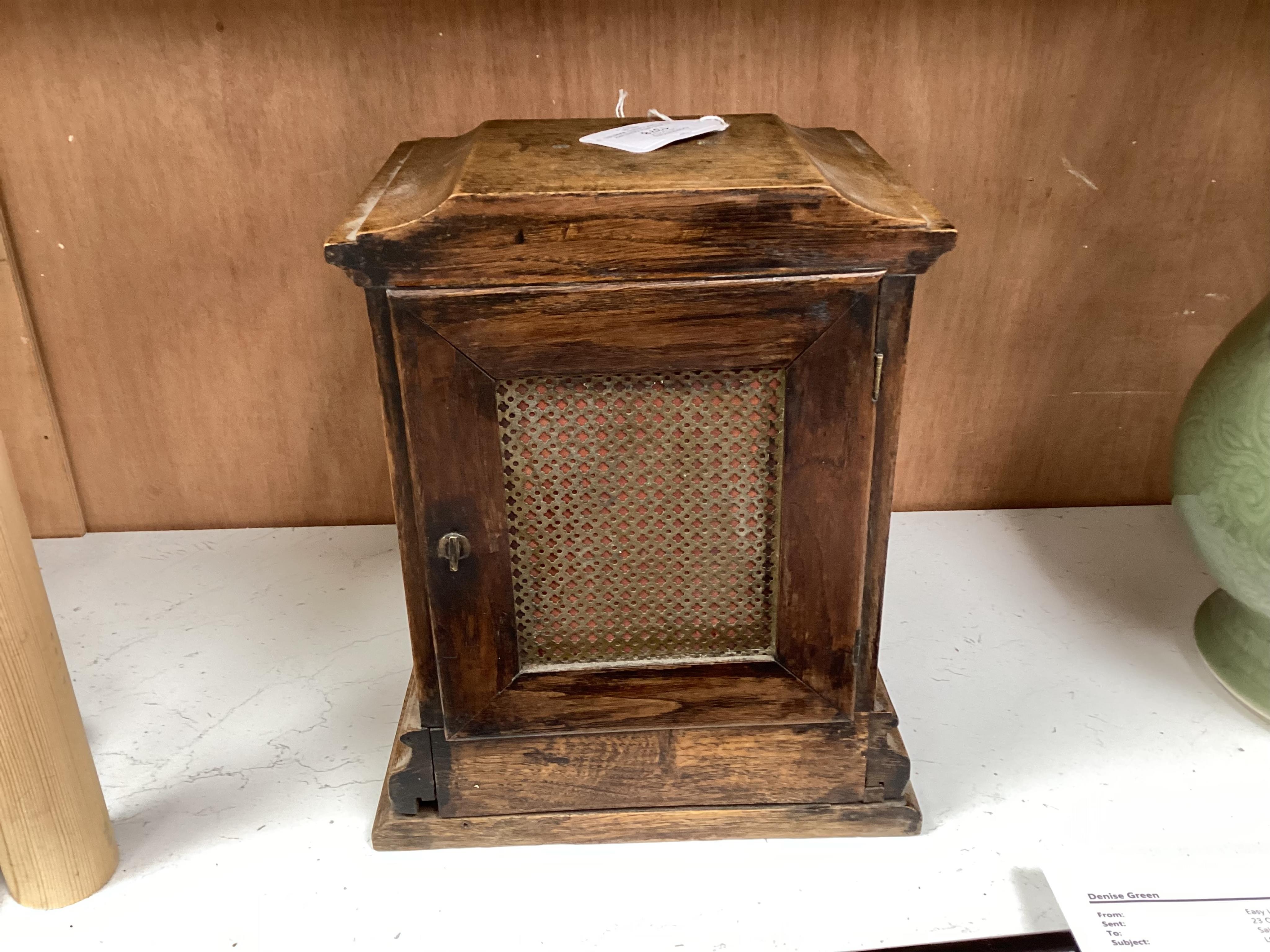 A late 19th century W&H oak cased mantel clock, chiming and striking on two coiled gongs, 27cm high. Condition - fair to good, missing the handle to the top